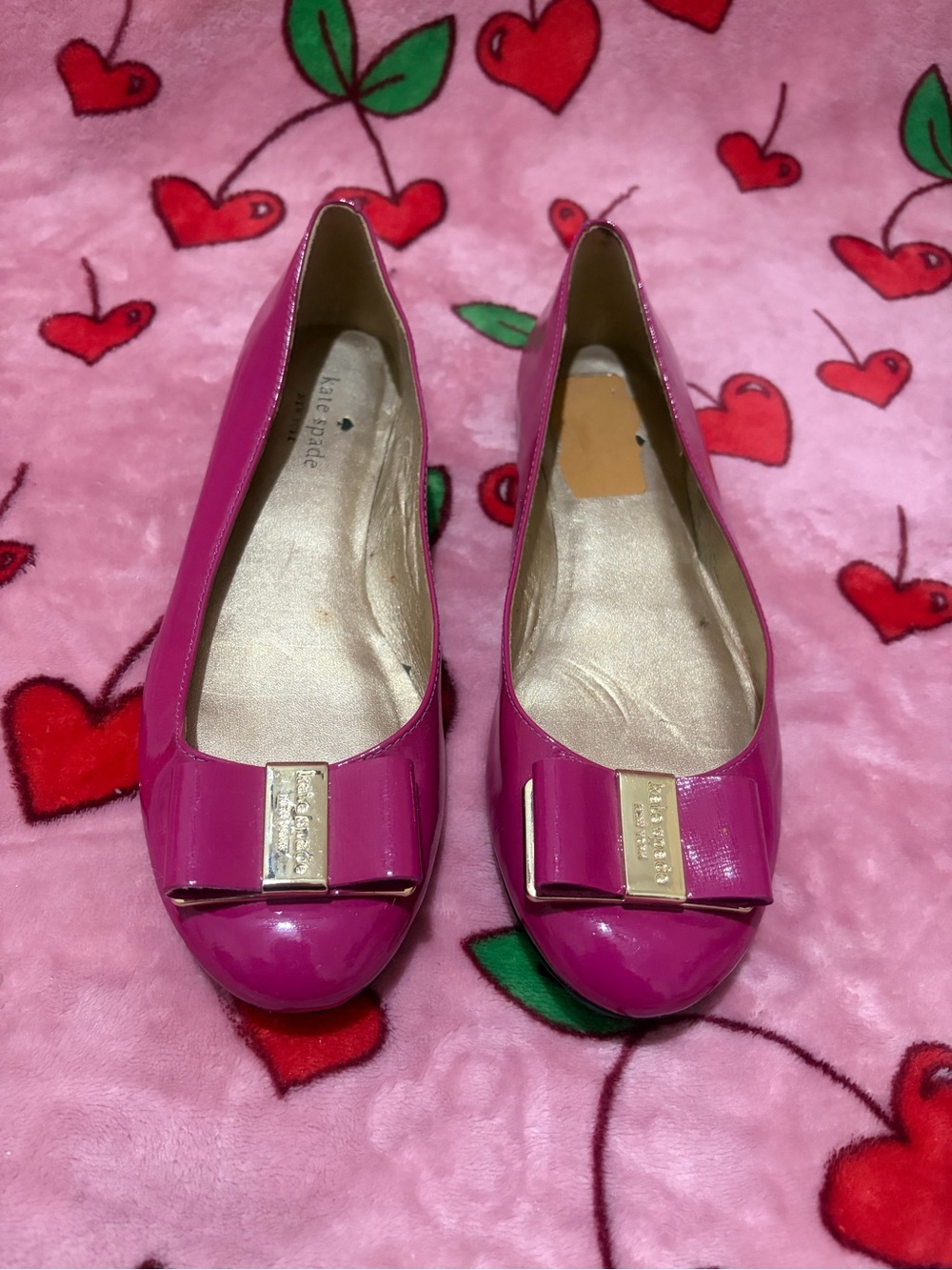 kate spade Fuschia Patent Leather Bow Flats with Gold Accent
